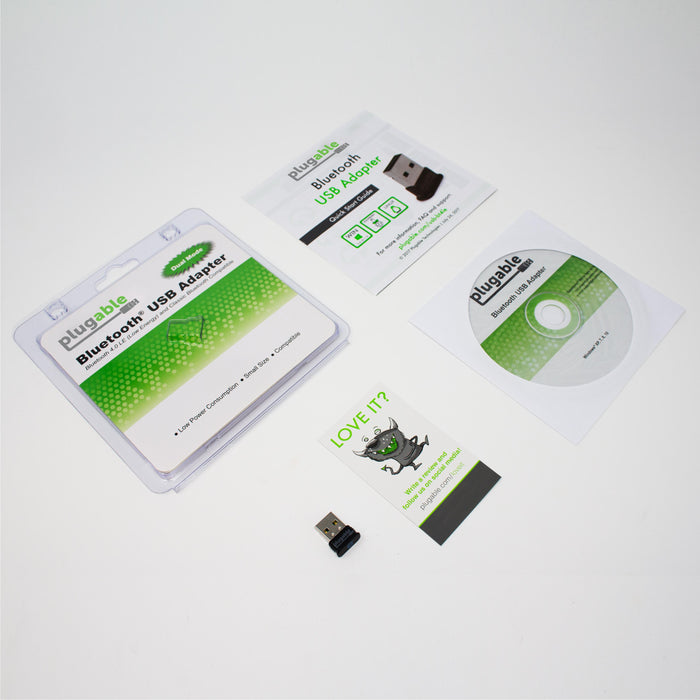 Plugable USB-BT4LE Bluetooth 4.0 LE adapter, retail packaging, quick start guide, driver CD, and support card.