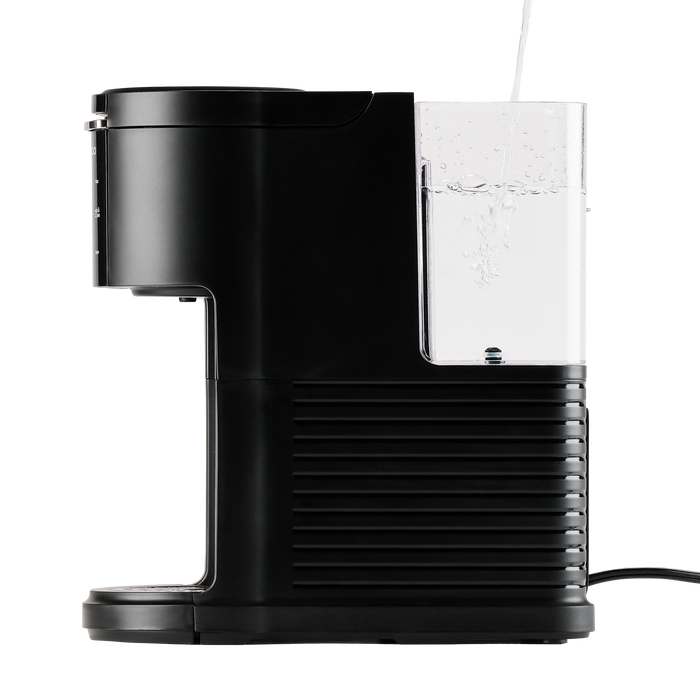 Side view of a black CUCKOO K-Cup single-serve coffee maker, showing water being poured into the transparent water tank. (CCM-AK011B)