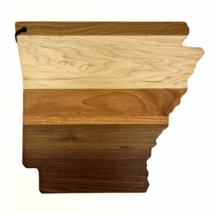 Top view of Arkansas-shaped cutting board with mixed wood types