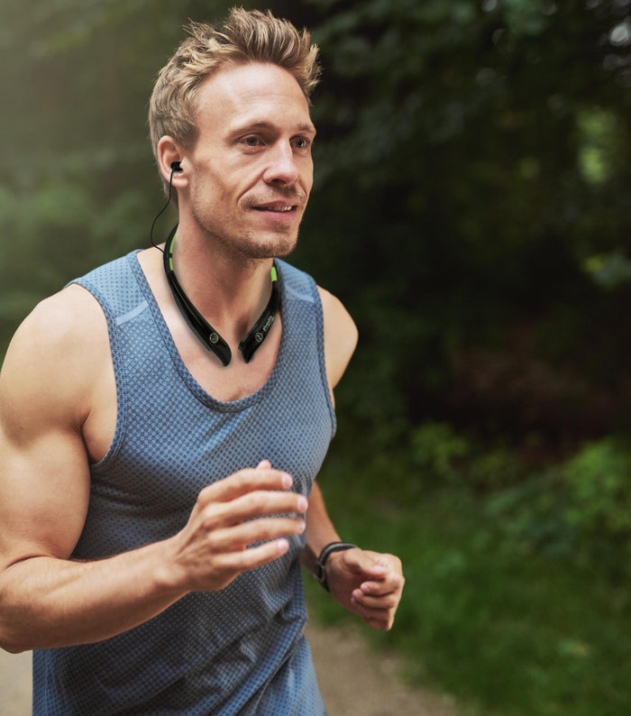 Plugable BT-HSFLEX Bluetooth sports headphones with flexible neckband worn by a runner.