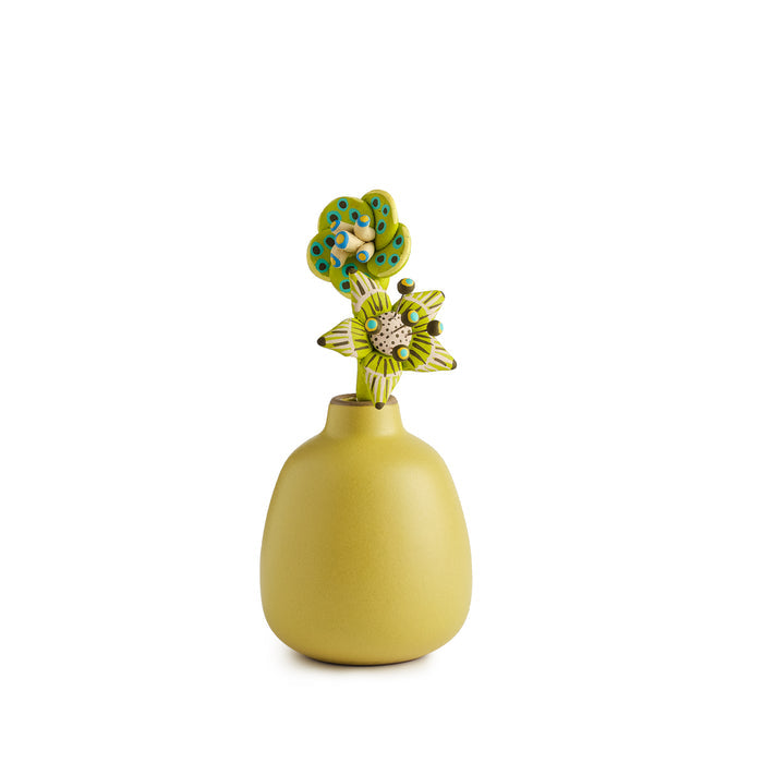Carla Fernandez Ceramic Circle Flower in Avocado in a Heath Ceramics Bud Vase in Avocado