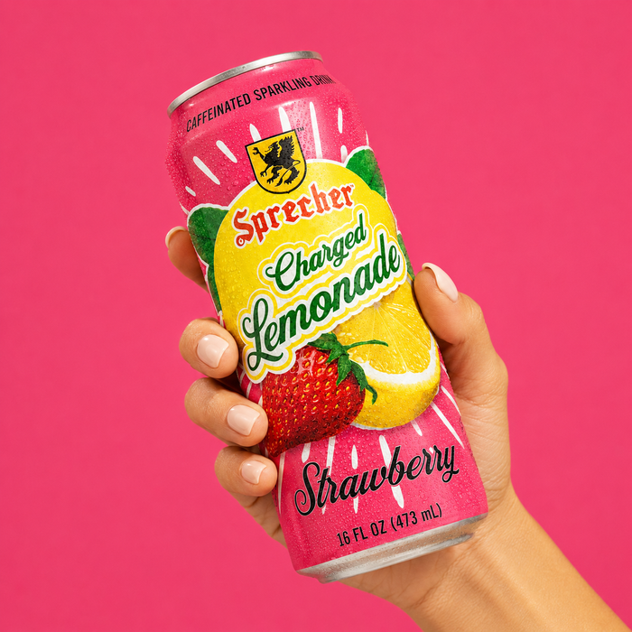 Hand holding a can of Sprecher Strawberry Charged Lemonade against a pink background