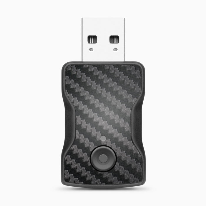 Black wireless car adapter with USB connector and carbon-fiber front panel