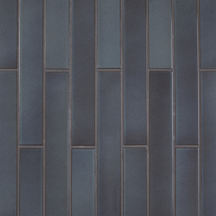 Caption: Classic Field 2x12 in G125 Meteorite. Dove Grey grout by Custom Building Products.
