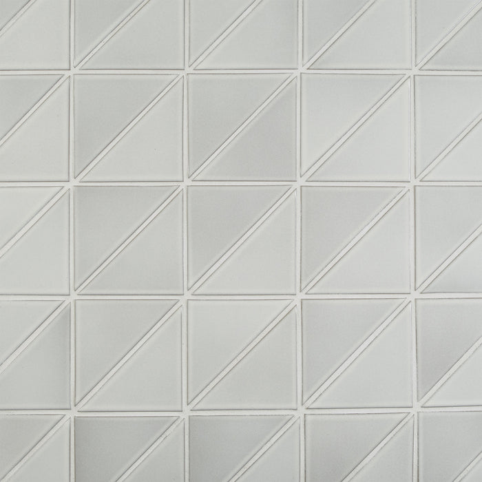 Caption: Classic Field 4" Triangle in G126 Buckwheat. Alabaster grout by Custom Building Products.