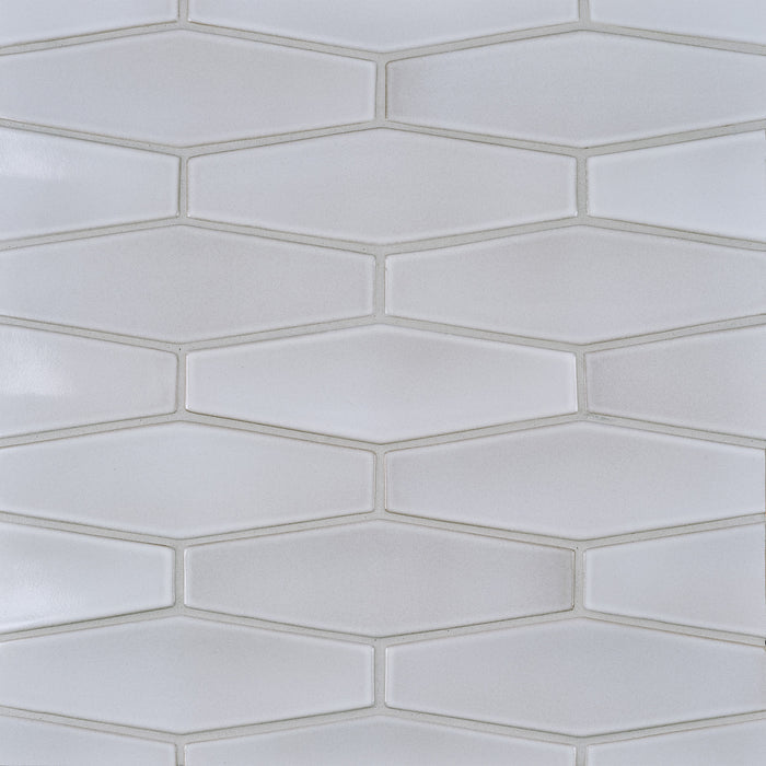 Caption: Dimensional Diamond in G133 Haze. Driftwood grout by Custom Building Products.