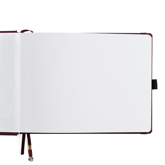 Open notebook with white pages on a white background