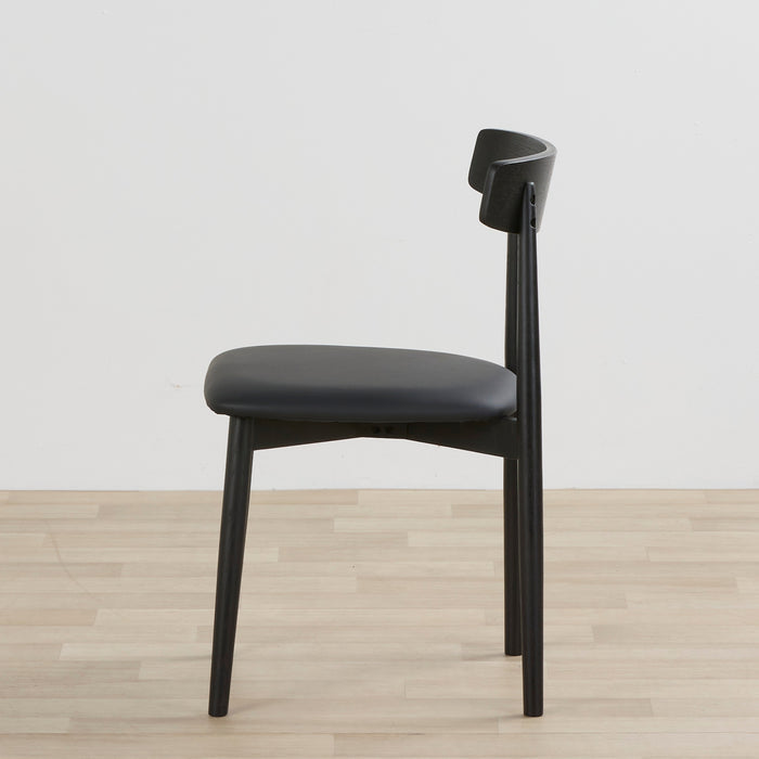 Side view of the Henry Dining Chair Black PU
