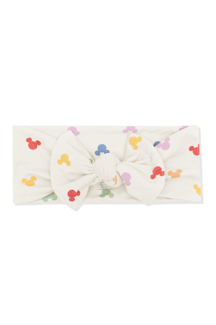 Knotted Bow with Pastel Mickey Mouse pattern on an oat background