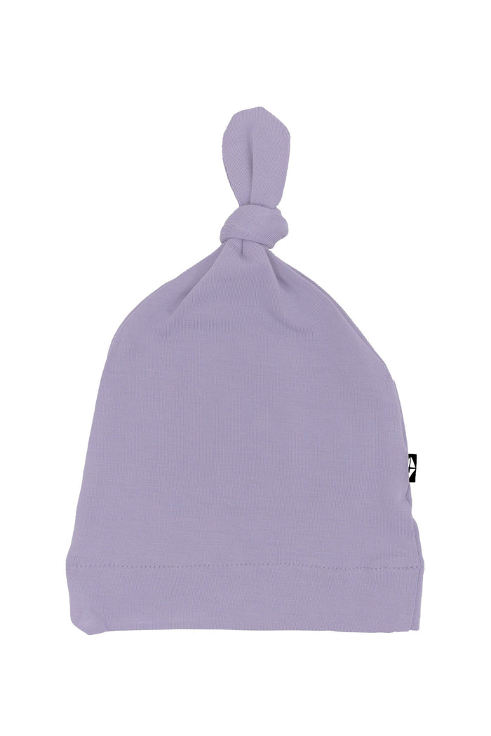 Flat lay of Kyte Baby Knotted Cap in Taro