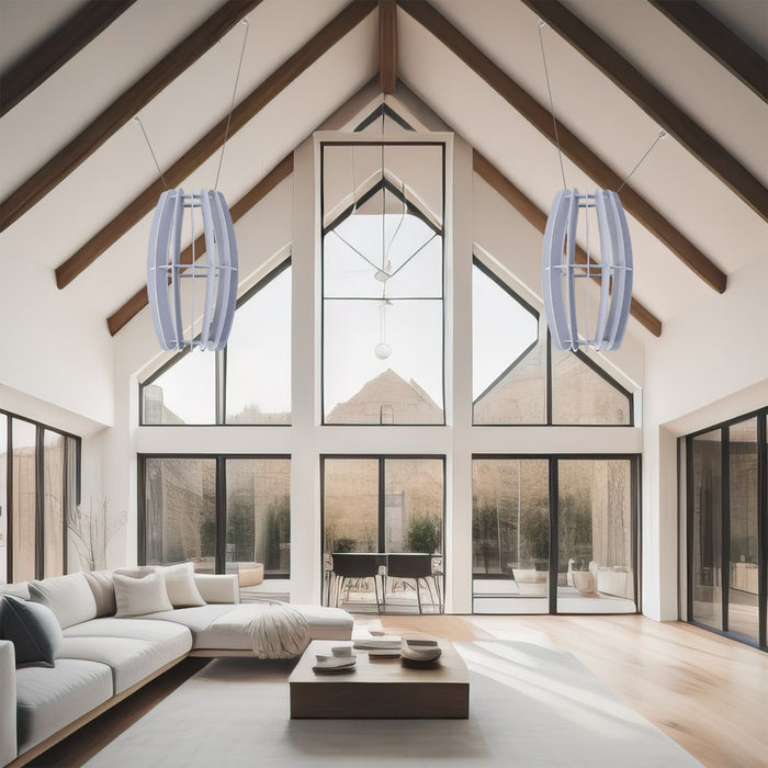 A large oval-shaped acoustic ceiling sound absorber in a light gray color in a modern living room.