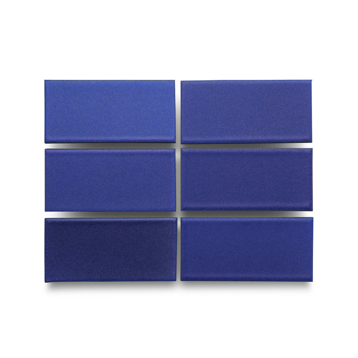 Six Heath Ceramics ceramic tiles glazed in Ultramarine, a vivid matte blue glaze
