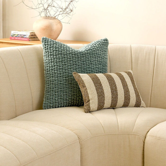 Maytex 50x50cm Cushion - Duck Egg, plush textured cushion styled on a cream curved sofa with striped cushion.