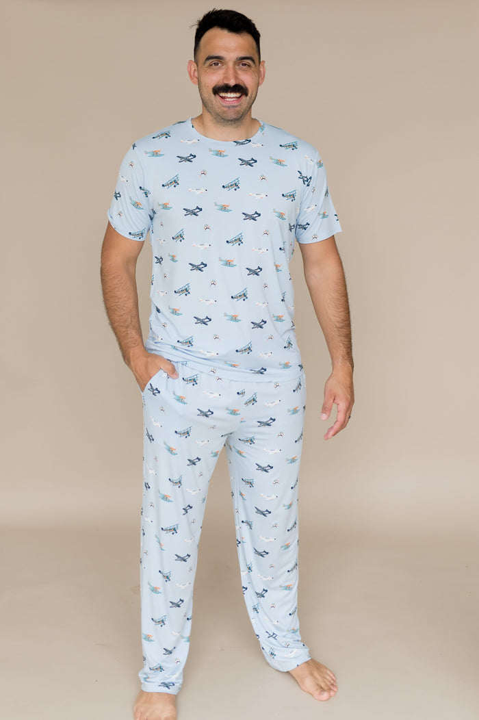 Mae modeling the Men's Crew Neck Tee in Take Off paired with Men's Lounge pants in Take off