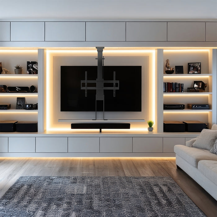 A motorized large TV mount with remote control, showing a flat panel TV attached to a ceiling mount with an extension pole.