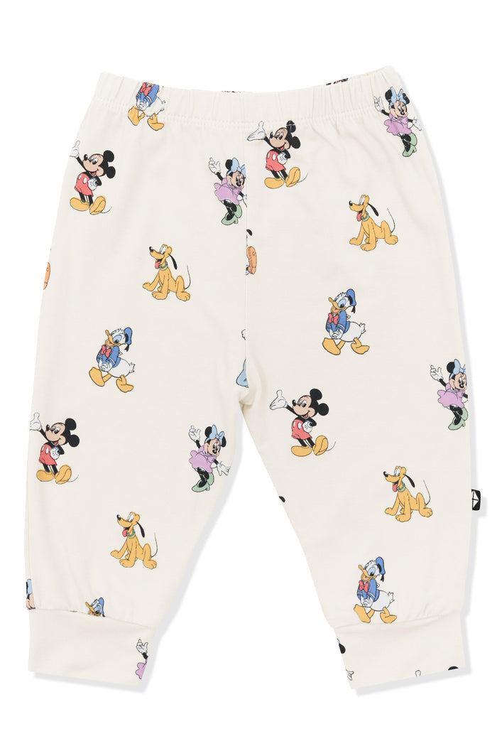 Pant with Mickey Mouse and Friends print on an oat background
