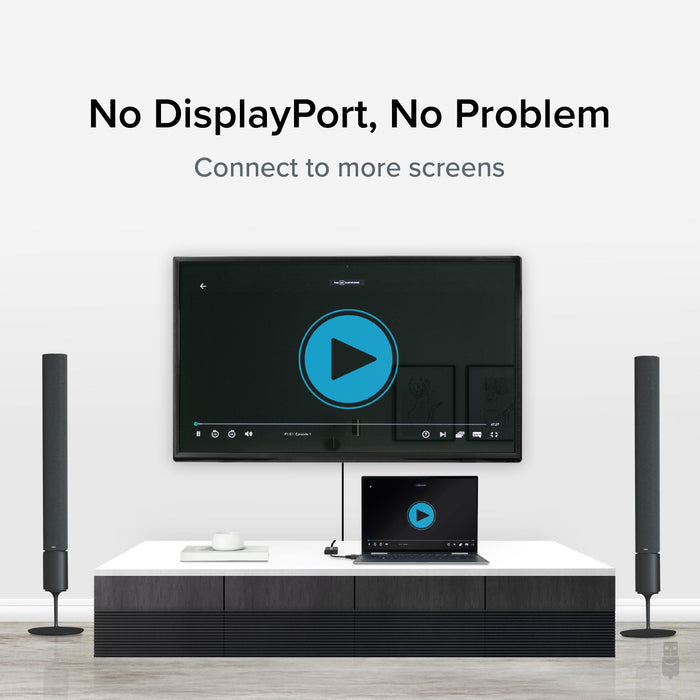 Plugable DPM-VGAF adapter connecting a laptop to a wall-mounted display screen.