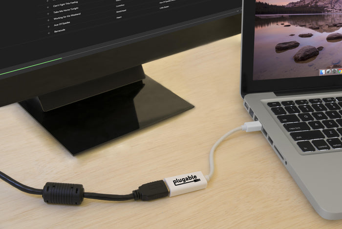Plugable Mini DisplayPort to HDMI adapter connecting a laptop to an external monitor.