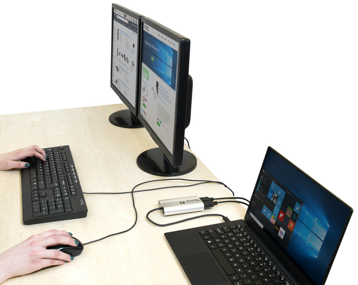 Plugable TBT3-DP2X Thunderbolt 3 adapter connecting a Windows laptop to two external DisplayPort monitors.