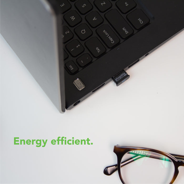 Plugable USB-BT4LE Bluetooth 4.0 Low Energy Micro Adapter plugged into a laptop USB port with Energy efficient text.