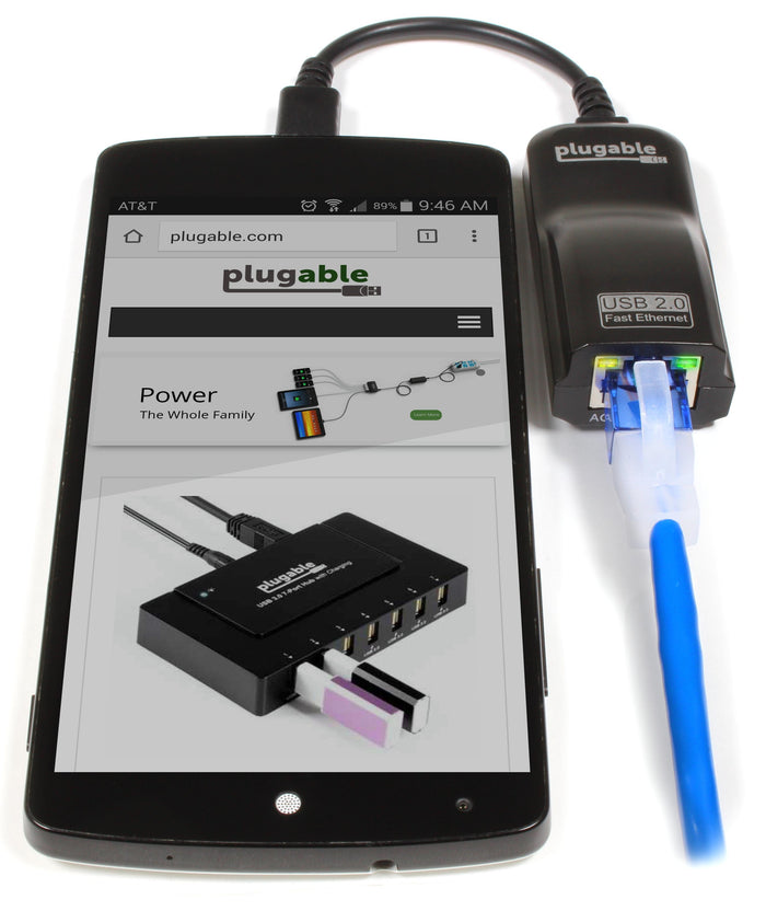 Plugable USB 2.0 Fast Ethernet adapter connected to a smartphone via Micro-B OTG cable with an RJ45 Ethernet cable.