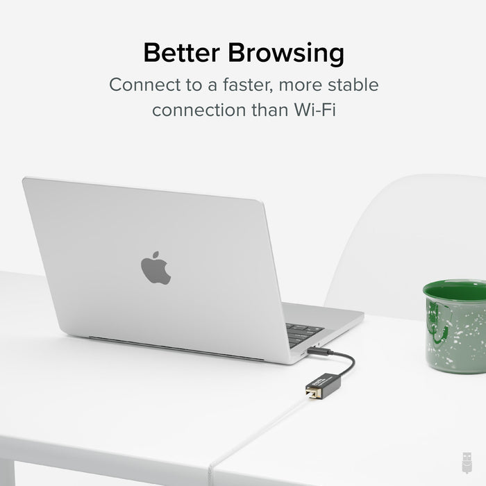 Plugable USBC-E1000 USB-C to Gigabit Ethernet adapter connected to a laptop for a stable wired network connection.