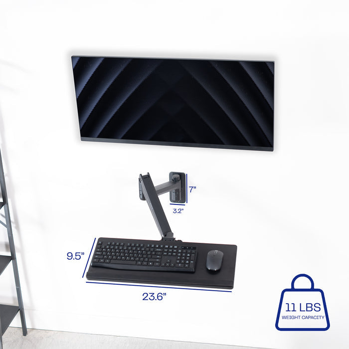 A wall mounted keyboard tray with a pneumatic mechanism with measurement text.