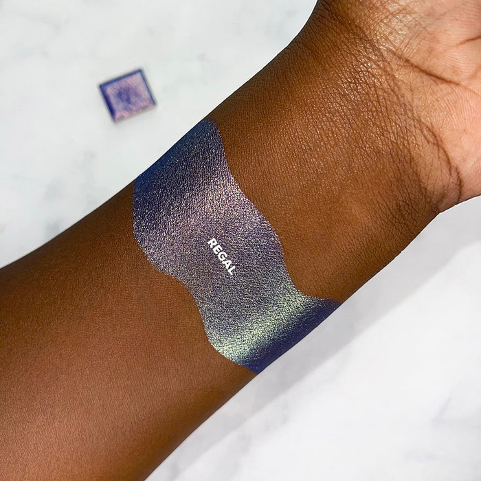 Arm swatch of Regal on deep skin.