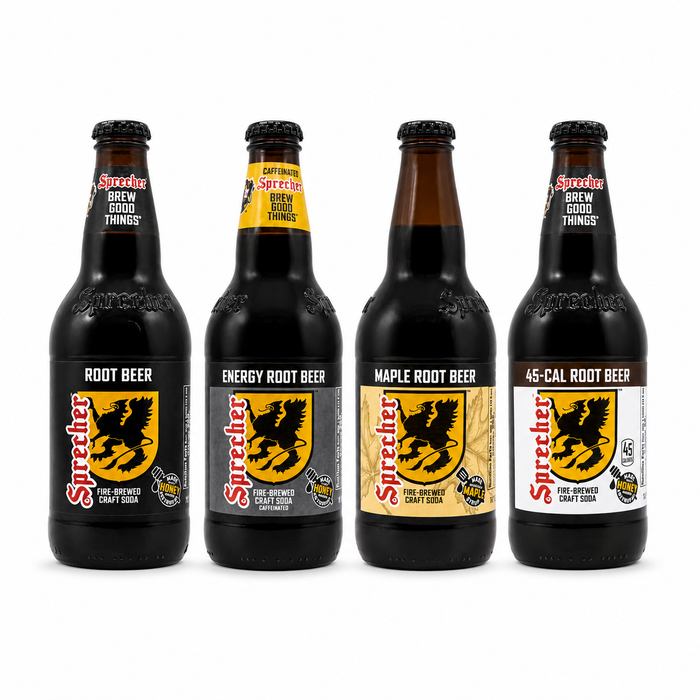 Four bottles of Sprecher root beer on a white background