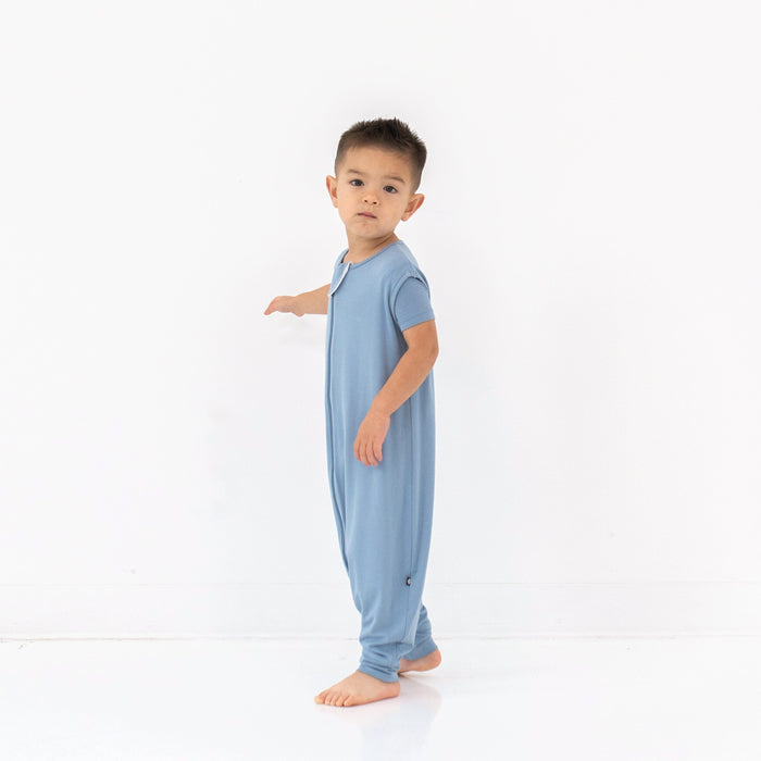 Model wearing the Sleep Bag Walker in Slate 0.5
