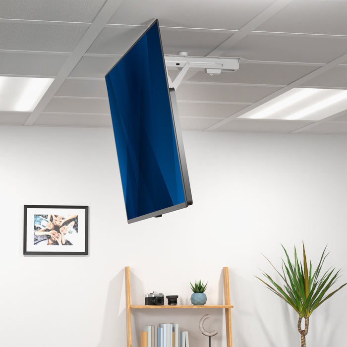 Flat-screen TV mounted in office or home space.